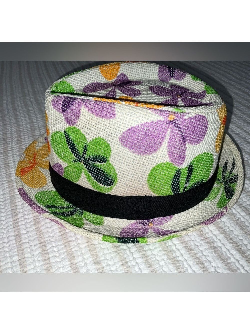 Floral paper/straw type fedora style hat with dark band - tag is size 58 (child)